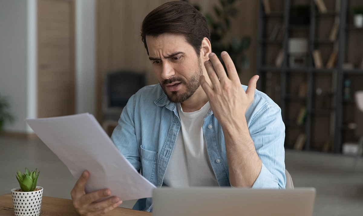 confused person looking at different length of lease contracts